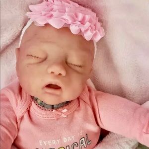 Silicone head cuddle baby